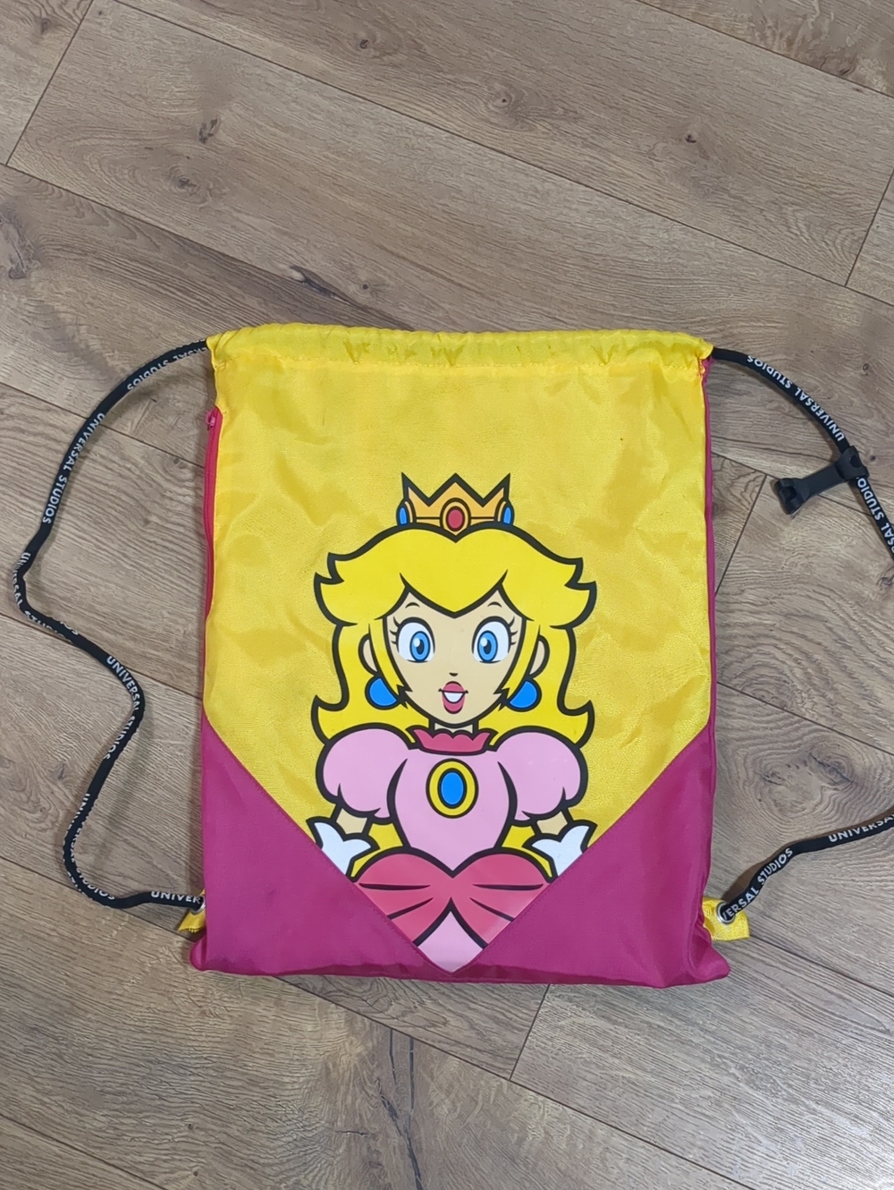 UNIVERSAL STUDIOS SUPER NINTENDO WORLD PRINCESS PEACH DRAWSTRING BACKPACK